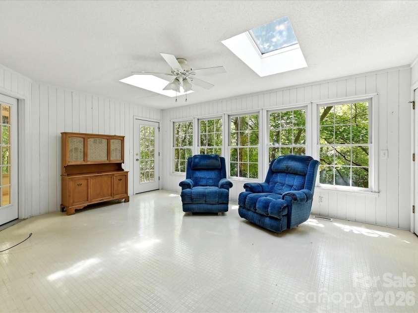 5950 King Wilkinson Road, Denver, NC 28037.  MLS# CAR4398523, YatesRealty ID 35480. Sunroom with skylights