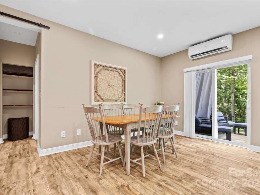 169 Pecan Hills Drive, Mooresville, NC 28115.  MLS# CAR4285952, YatesRealty ID 35482. Basement Dining area with sliding glass doors out to back patio