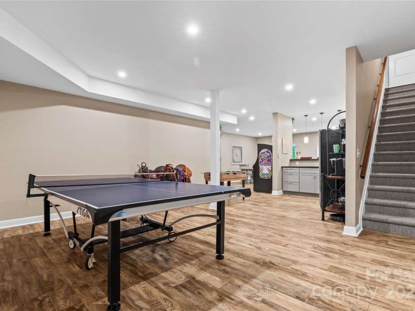 169 Pecan Hills Drive, Mooresville, NC 28115.  MLS# CAR4285952, YatesRealty ID 35482. Basement game room area
