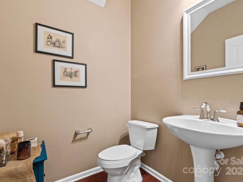 169 Pecan Hills Drive, Mooresville, NC 28115.  MLS# CAR4285952, YatesRealty ID 35482. Half bath on main