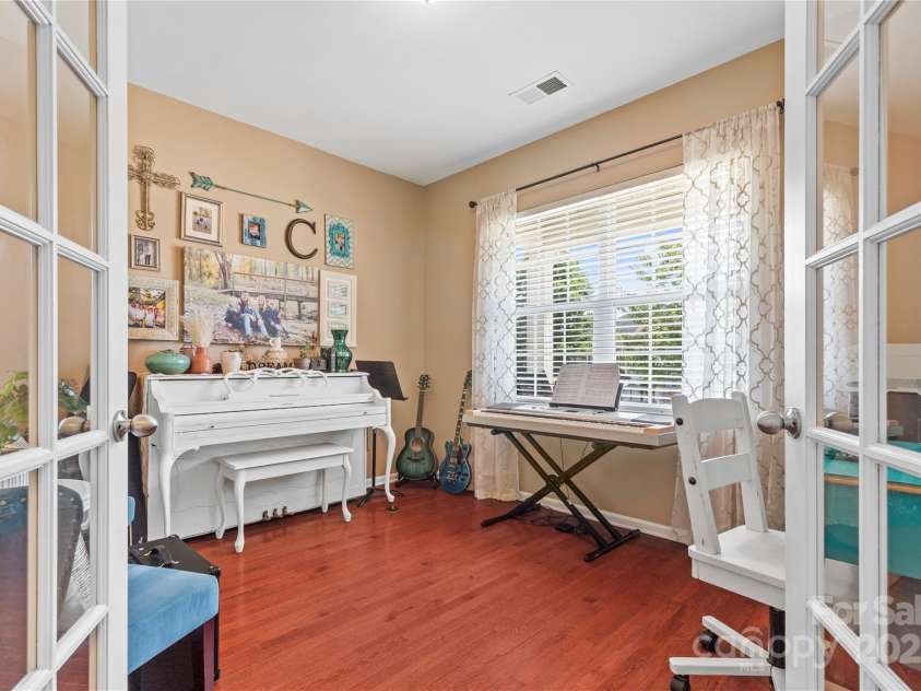 169 Pecan Hills Drive, Mooresville, NC 28115.  MLS# CAR4285952, YatesRealty ID 35482. Office/flex space on main with french doors and street view.
