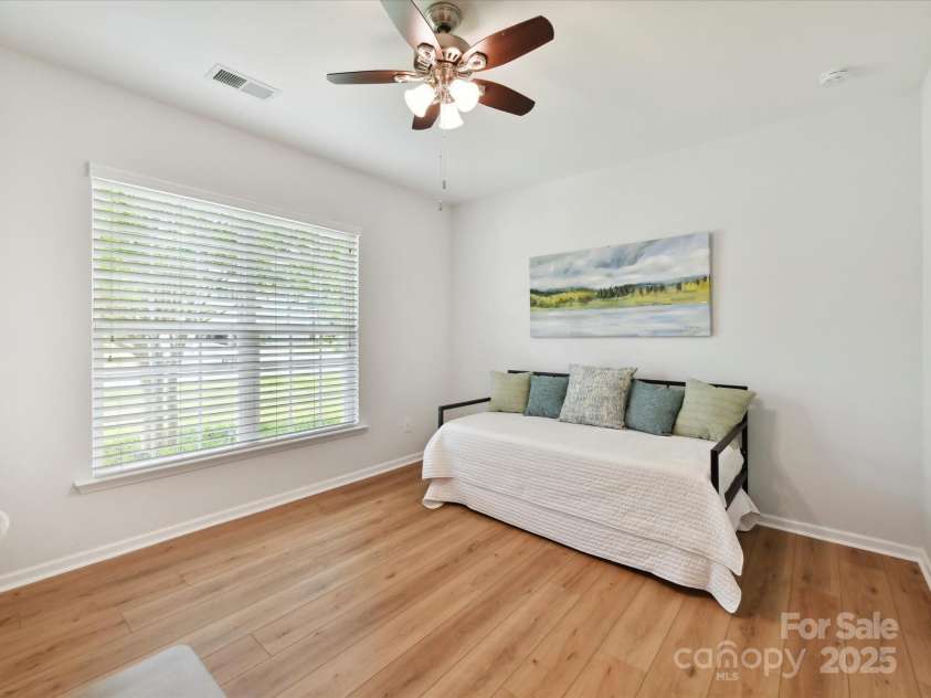 200 Sweet Briar Drive, Indian Land, SC 29707.  MLS# CAR4265722, YatesRealty ID 35484. A charming and spacious third bedroom with ceiling fan.