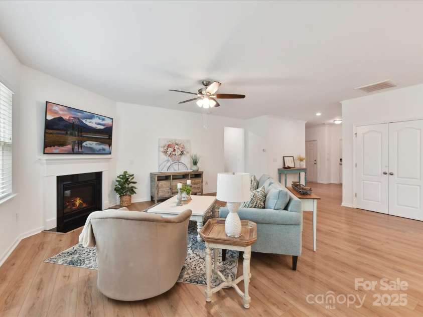 200 Sweet Briar Drive, Indian Land, SC 29707.  MLS# CAR4265722, YatesRealty ID 35484. A gas fireplace adds warmth to the family room.