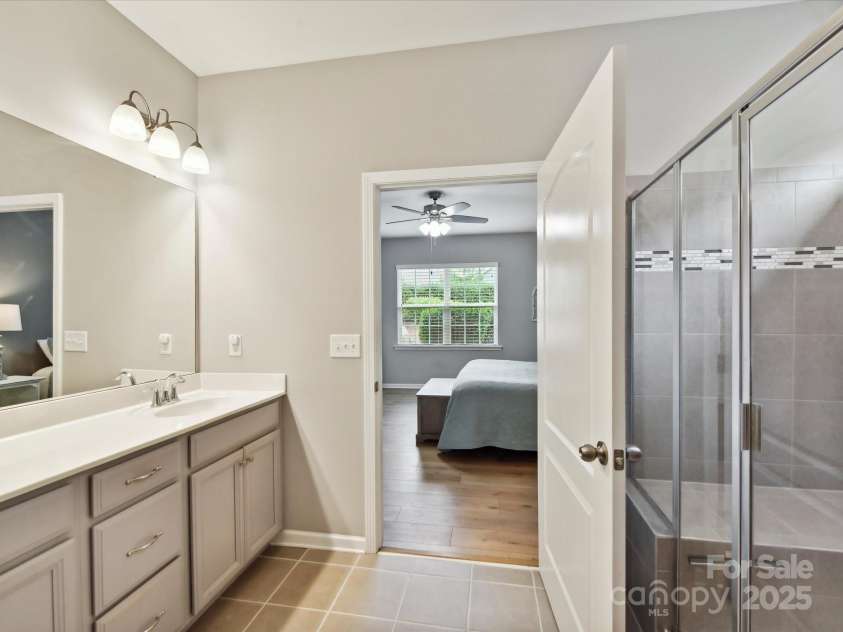200 Sweet Briar Drive, Indian Land, SC 29707.  MLS# CAR4265722, YatesRealty ID 35484. Light neutral colors make this bathroom appealing.