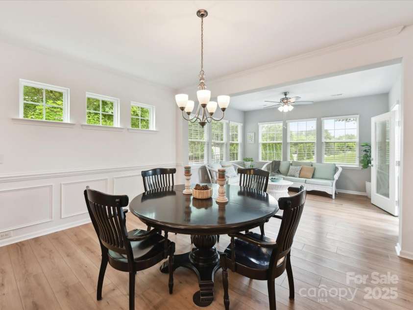 200 Sweet Briar Drive, Indian Land, SC 29707.  MLS# CAR4265722, YatesRealty ID 35484. The dining space overlooks the sunroom.