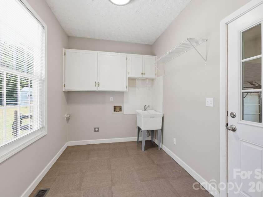 4650 NC 801 Highway, Woodleaf, NC 27054.  MLS# CAR4399692, YatesRealty ID 35485. Laundry room