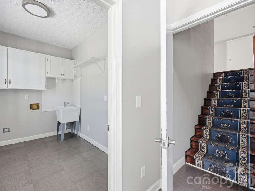 4650 NC 801 Highway, Woodleaf, NC 27054.  MLS# CAR4399692, YatesRealty ID 35485. Stairway to bonus room