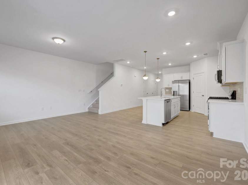 2694 Yeager Drive, Concord, NC 28027.  MLS# CAR4391059, YatesRealty ID 35486. Family room
