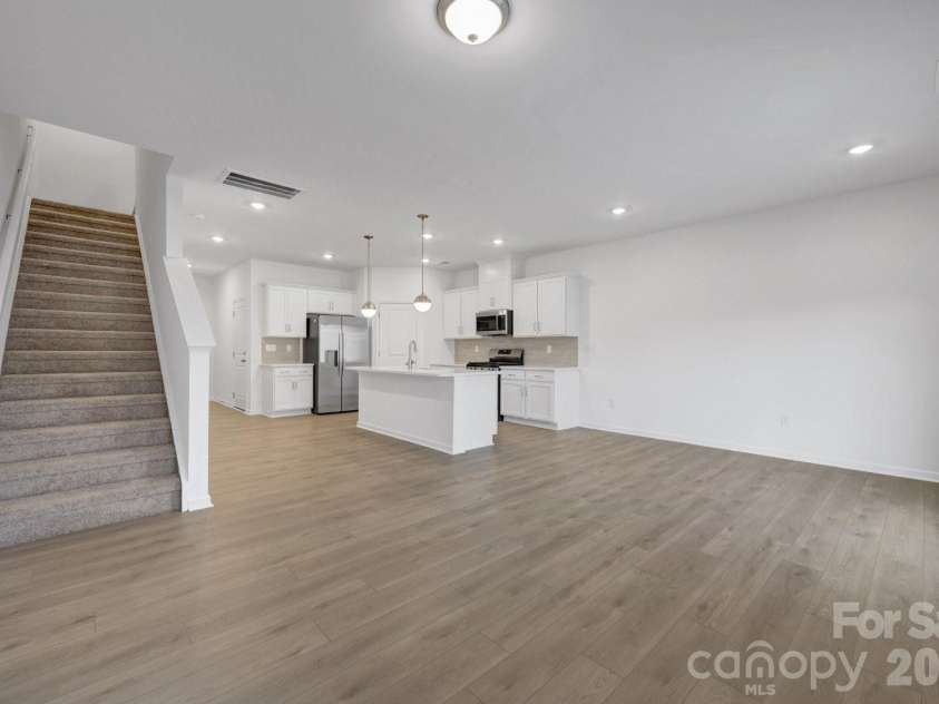 2694 Yeager Drive, Concord, NC 28027.  MLS# CAR4391059, YatesRealty ID 35486. Family room
