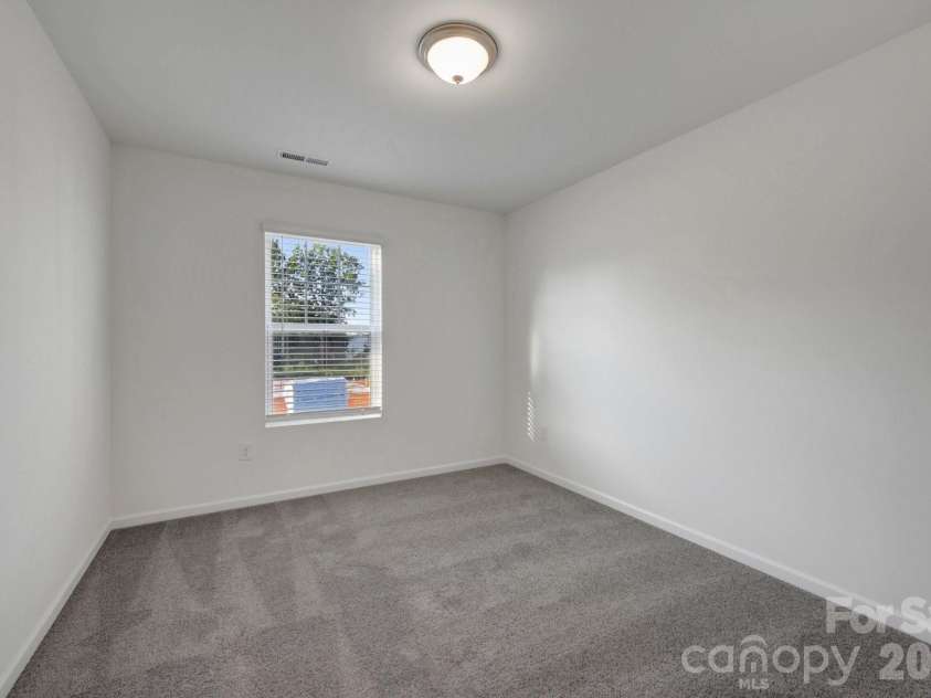 2694 Yeager Drive, Concord, NC 28027.  MLS# CAR4391059, YatesRealty ID 35486. Secondary bedroom