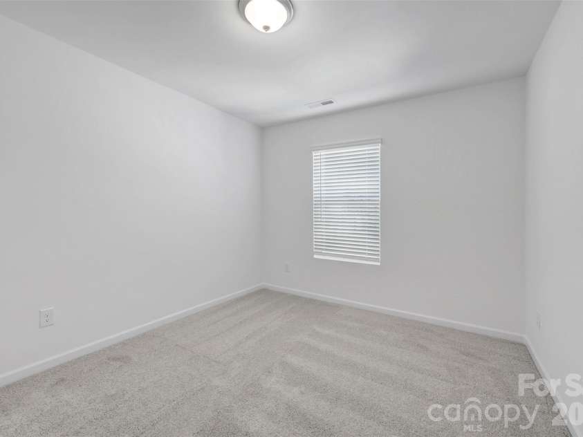 781 Kitfox Drive, Concord, NC 28027.  MLS# CAR4391069, YatesRealty ID 35489. Secondary bedroom