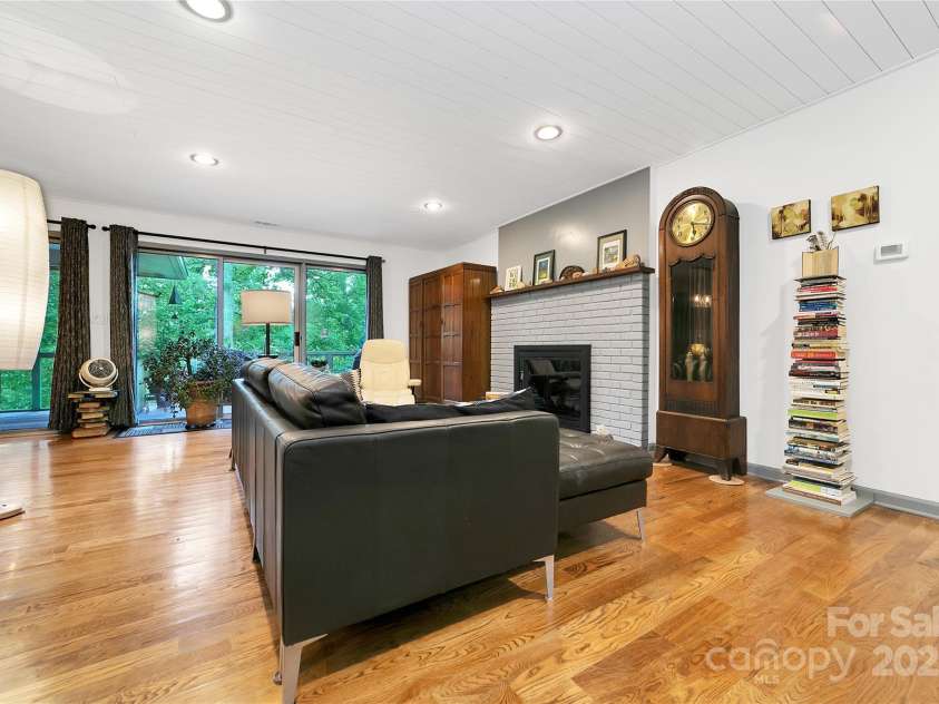 167 Essex Circle, Brevard, NC 28712.  MLS# CAR4294920, YatesRealty ID 35490. Beautiful  hardwood floor in light filled living area.