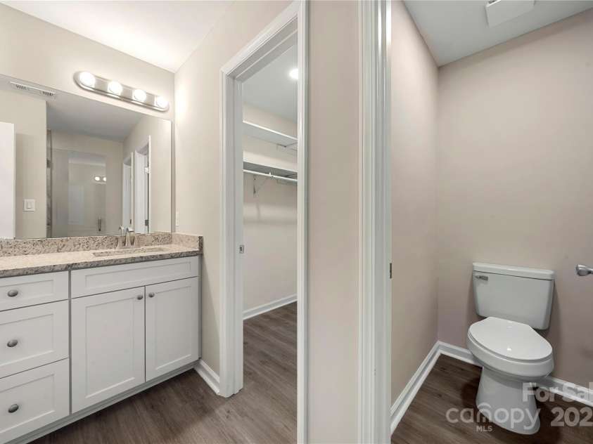 11120 Michaelangelo Court, Charlotte, NC 28226.  MLS# CAR4285230, YatesRealty ID 35495. New granite countertops, cabinets, drawers and fixtures in the baths.