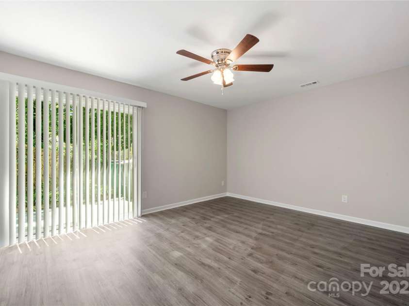11120 Michaelangelo Court, Charlotte, NC 28226.  MLS# CAR4285230, YatesRealty ID 35495. New sliding glass door in Primary suite