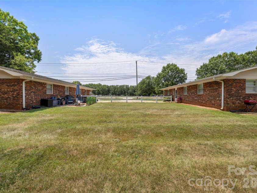 6010 Pleasant Grove Road, Charlotte, NC 28216.  MLS# CAR4401539, YatesRealty ID 35498. 