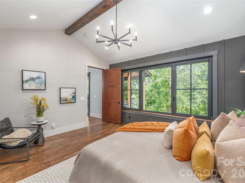 28 & 30 Garren View Drive, Fairview, NC 28730.  MLS# CAR4397889, YatesRealty ID 35499. Primary suite with large windows