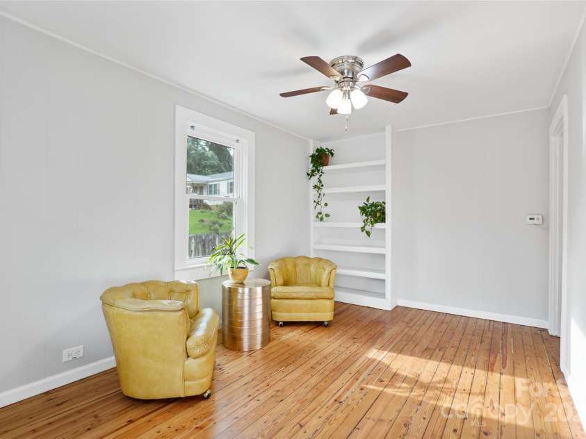 364 State Street, Asheville, NC 28806.  MLS# CAR4294913, YatesRealty ID 35499. Inviting living room with refinished floors, built in shelves and fresh interior paint