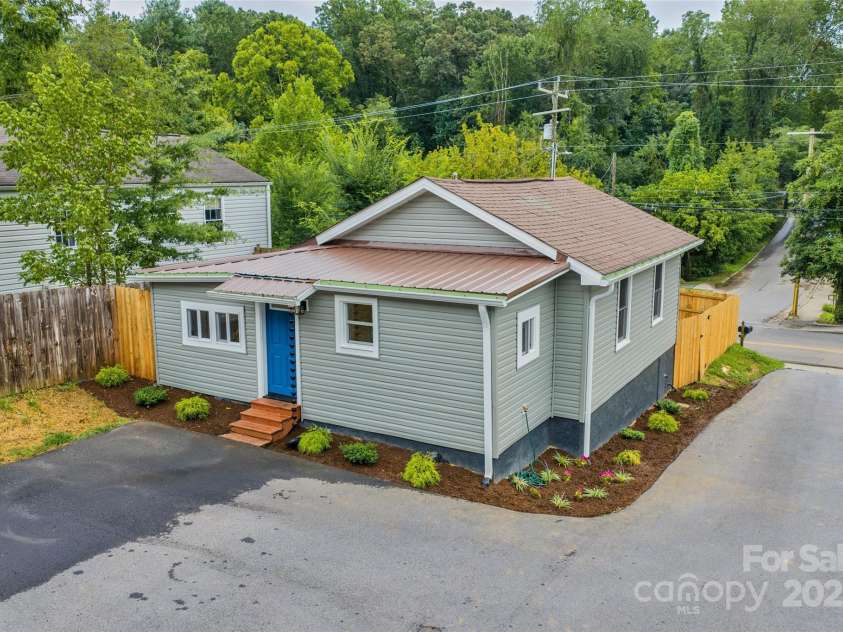 364 State Street, Asheville, NC 28806.  MLS# CAR4294913, YatesRealty ID 35499. Rear view of Bungalow with recent landscaping and plenty of on site paved parking