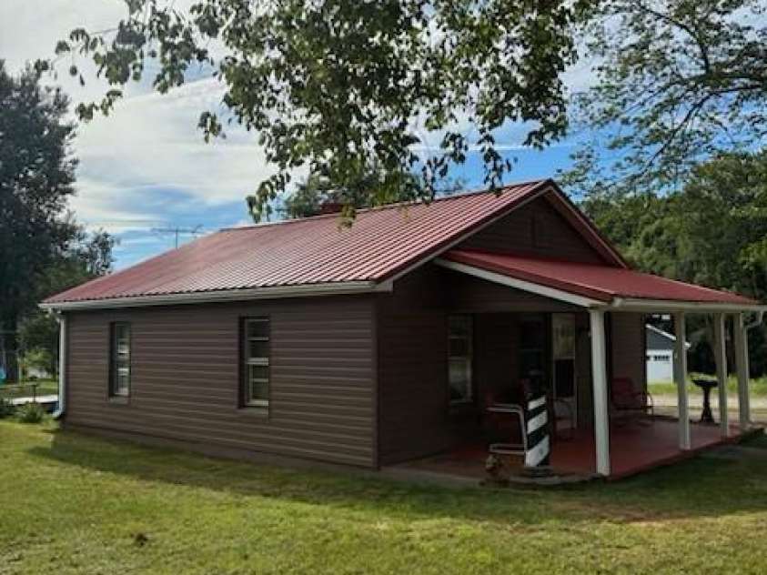 529 Cedar Street, Troutman, NC 28166.  MLS# CAR4397569, YatesRealty ID 35501. Covered back deck.