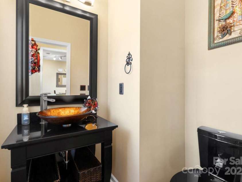 173 Painted Bunting Drive, Troutman, NC 28166.  MLS# CAR4293533, YatesRealty ID 35502. Downstairs Powder Room