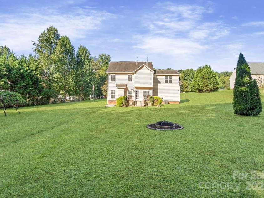 173 Painted Bunting Drive, Troutman, NC 28166.  MLS# CAR4293533, YatesRealty ID 35502. Large Back Yard