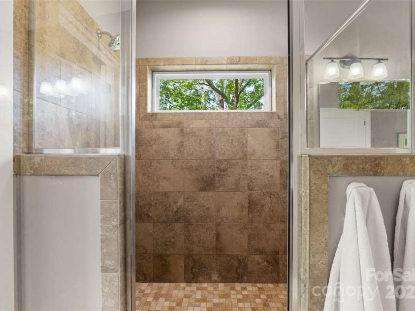 221 Starry Night Lane, Marshall, NC 28753.  MLS# CAR4297085, YatesRealty ID 35517. Close up of oversized walk in tiled shower