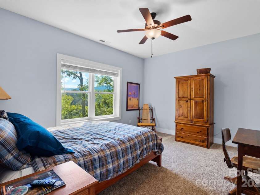 221 Starry Night Lane, Marshall, NC 28753.  MLS# CAR4297085, YatesRealty ID 35517. Guest bedroom 1 with year round mountain views