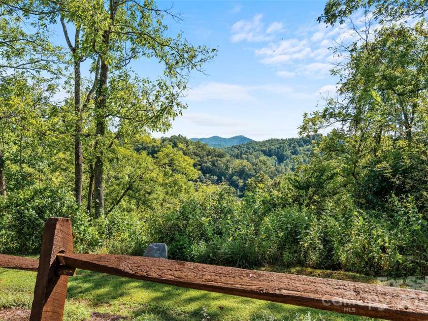 221 Starry Night Lane, Marshall, NC 28753.  MLS# CAR4297085, YatesRealty ID 35517. Year round mountain views from the driveway