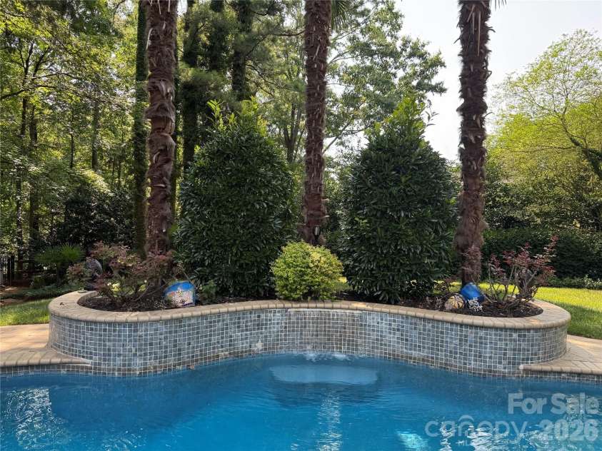 10536 Providence Arbours Drive, Charlotte, NC 28270.  MLS# CAR4397892, YatesRealty ID 35519. Gorgeous Pool with two waterfalls!