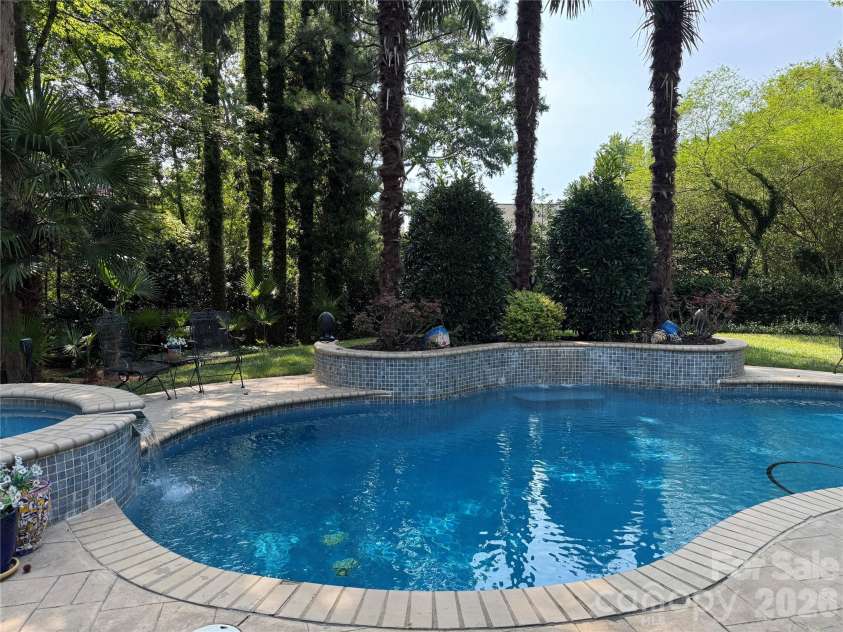 10536 Providence Arbours Drive, Charlotte, NC 28270.  MLS# CAR4397892, YatesRealty ID 35519. Spa can be heated and has the second waterfall!