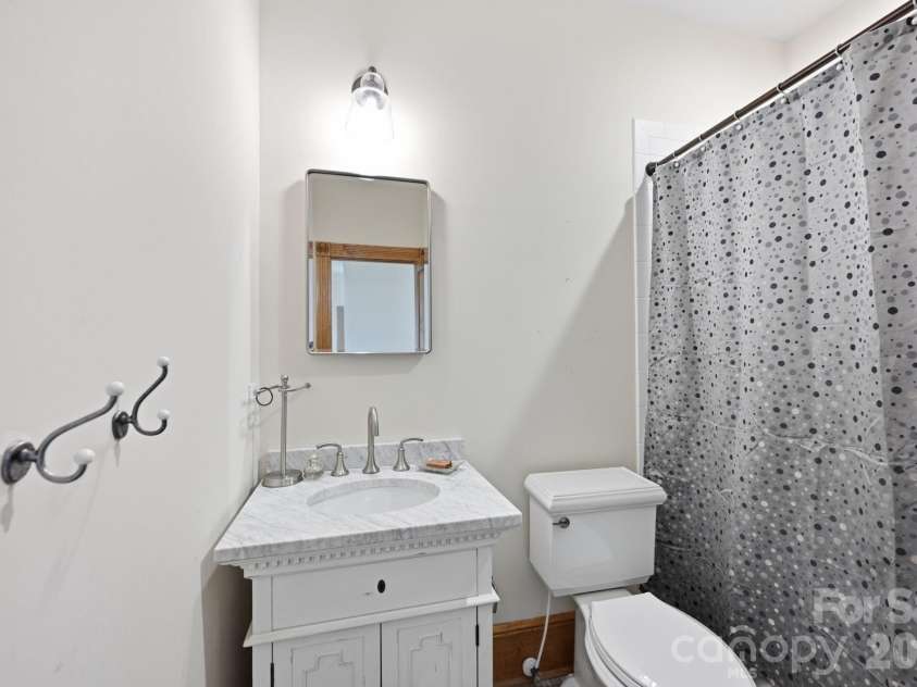 519 South Street, Davidson, NC 28036.  MLS# CAR4400565, YatesRealty ID 35525. Downstairs Full Bath  Back Hallway