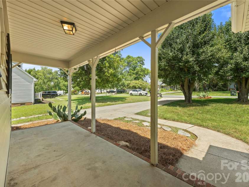 3571 Farm Lake Drive, Concord, NC 28027.  MLS# CAR4397456, YatesRealty ID 35526. Great covered front porch