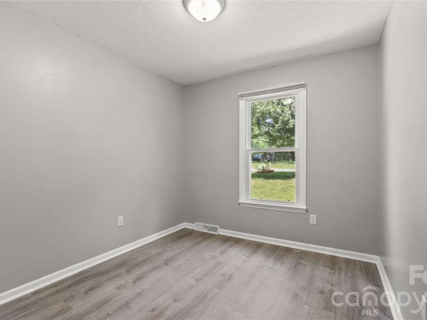3571 Farm Lake Drive, Concord, NC 28027.  MLS# CAR4397456, YatesRealty ID 35526. Third bedroom