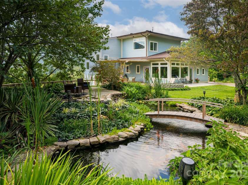 315 Earlys Mountain Road, Leicester, NC 28748.  MLS# CAR4295001, YatesRealty ID 35531. Beautiful Koi Pond with waterfall feature.