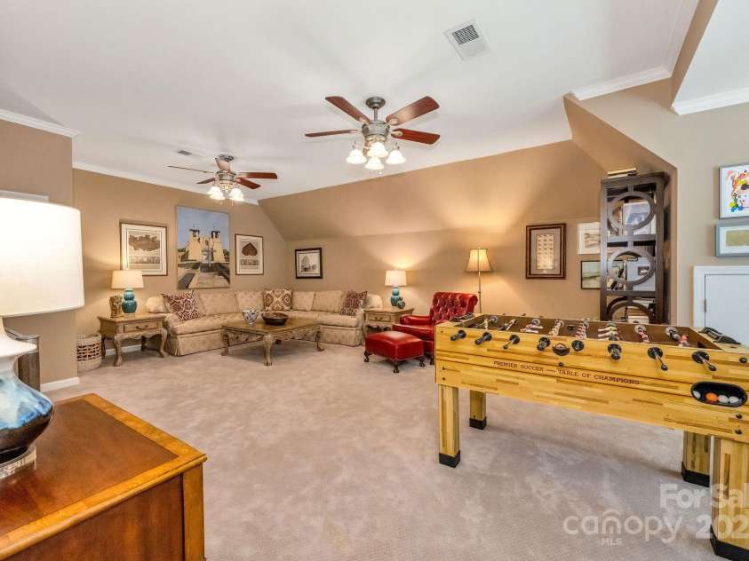 101 Cabana Drive, Mooresville, NC 28117.  MLS# CAR4293731, YatesRealty ID 35535. HUGE bonus room (upstairs) has attached half bath and multiple storage areas.