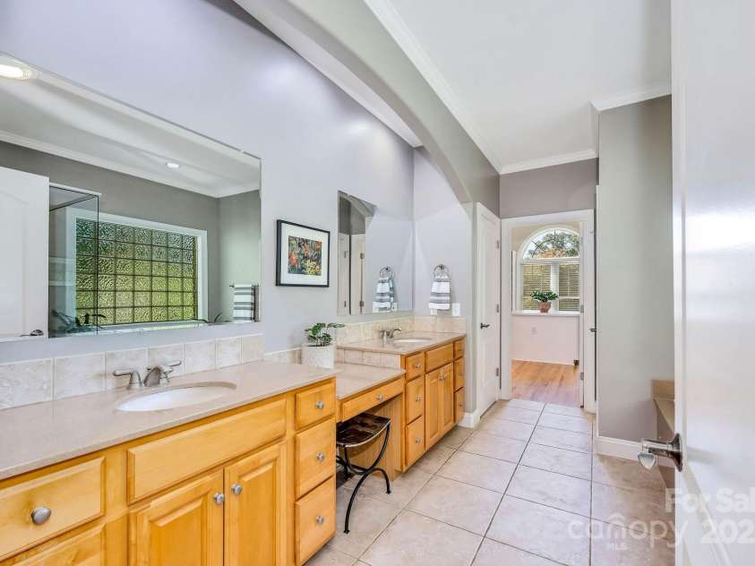101 Cabana Drive, Mooresville, NC 28117.  MLS# CAR4293731, YatesRealty ID 35535. Spacious primary leading to the dressing room walk in closet