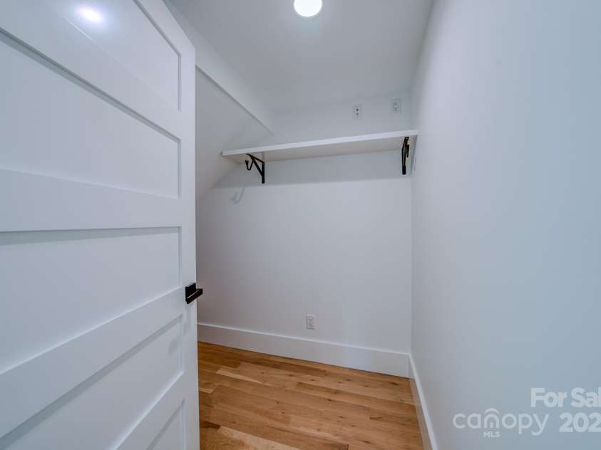 133 Grove Street, Asheville, NC 28801.  MLS# CAR4286313, YatesRealty ID 35540. First Floor Under Stairs Storage