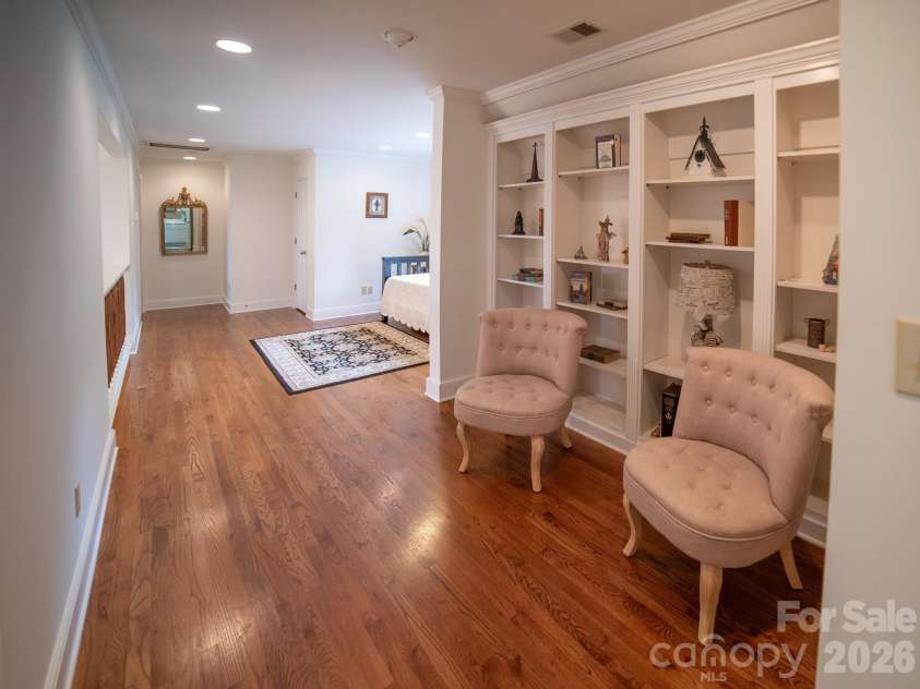 1513 Brentwood Place, Morganton, NC 28655.  MLS# CAR4307275, YatesRealty ID 35546. Library area on upper level.