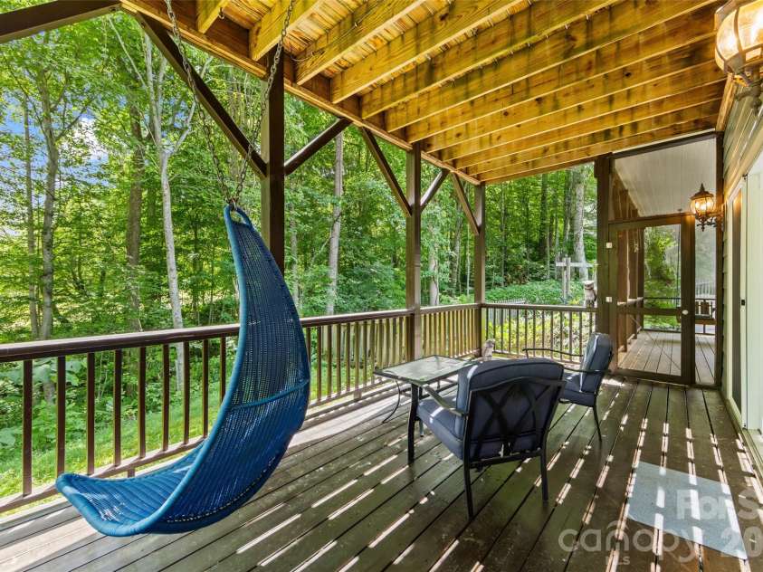 435 Stepping Stone Lane, Waynesville, NC 28786.  MLS# CAR4399751, YatesRealty ID 35549. Lower level deck access thru Rec room