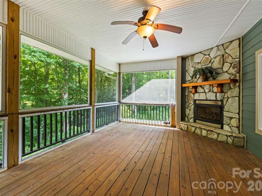 435 Stepping Stone Lane, Waynesville, NC 28786.  MLS# CAR4399751, YatesRealty ID 35549. Main level deck