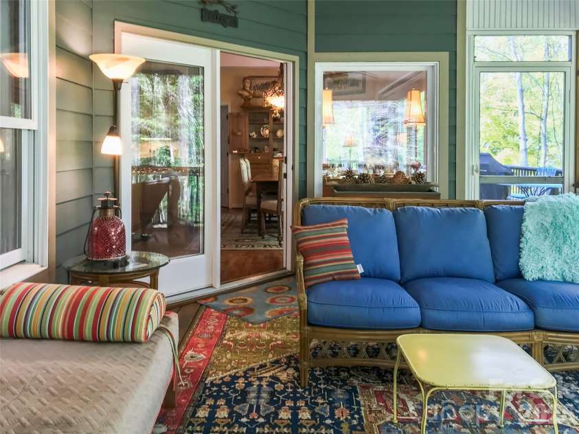 435 Stepping Stone Lane, Waynesville, NC 28786.  MLS# CAR4399751, YatesRealty ID 35549. Virtual Main level screened deck view 1.