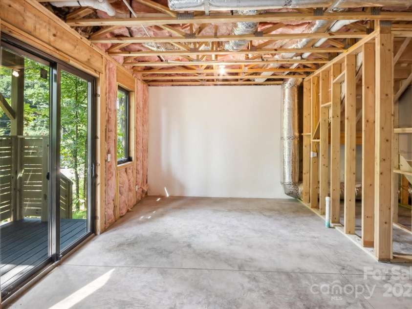 207 Torch Light Way, Asheville, NC 28806.  MLS# CAR4159369, YatesRealty ID 3555. Basement Family Room