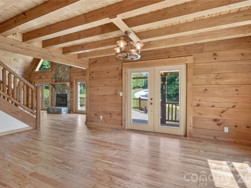 335 Whites Lake Boulevard, Saluda, NC 28773.  MLS# CAR4390961, YatesRealty ID 35568. Dining room from the kitchen.