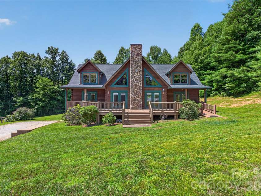 335 Whites Lake Boulevard, Saluda, NC 28773.  MLS# CAR4390961, YatesRealty ID 35568. Front of home