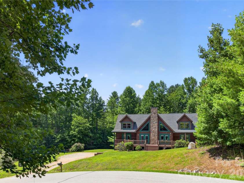 335 Whites Lake Boulevard, Saluda, NC 28773.  MLS# CAR4390961, YatesRealty ID 35568. Front view from White Lakes Blvd.