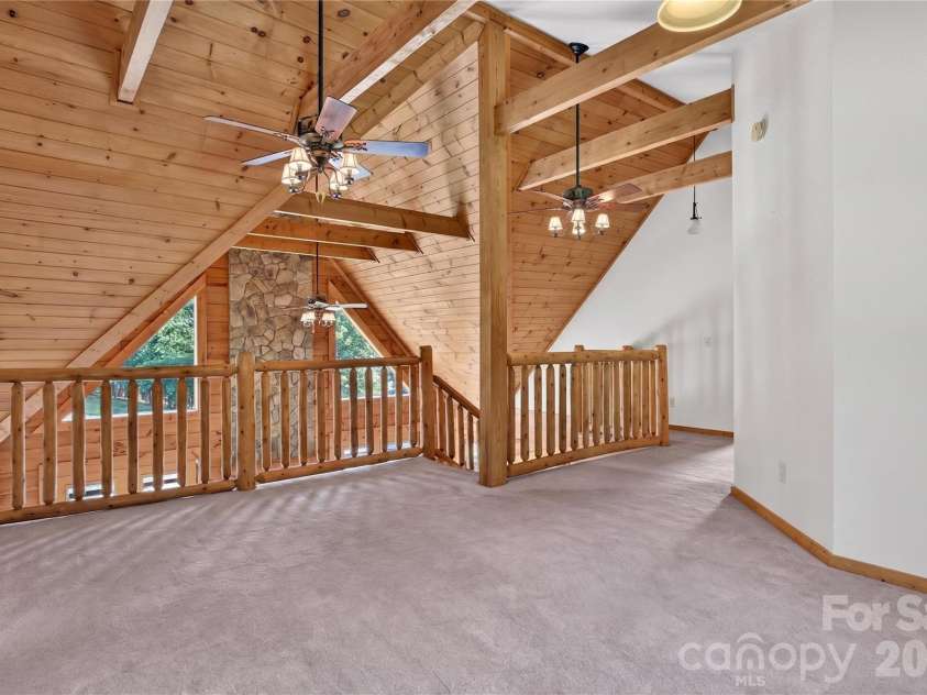 335 Whites Lake Boulevard, Saluda, NC 28773.  MLS# CAR4390961, YatesRealty ID 35568. Open loft.