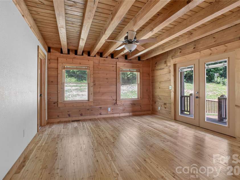 335 Whites Lake Boulevard, Saluda, NC 28773.  MLS# CAR4390961, YatesRealty ID 35568. Primary bedroom.