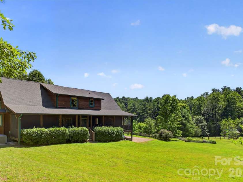 335 Whites Lake Boulevard, Saluda, NC 28773.  MLS# CAR4390961, YatesRealty ID 35568. Rear view.