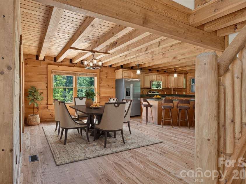 335 Whites Lake Boulevard, Saluda, NC 28773.  MLS# CAR4390961, YatesRealty ID 35568. Virtually staged dining room.