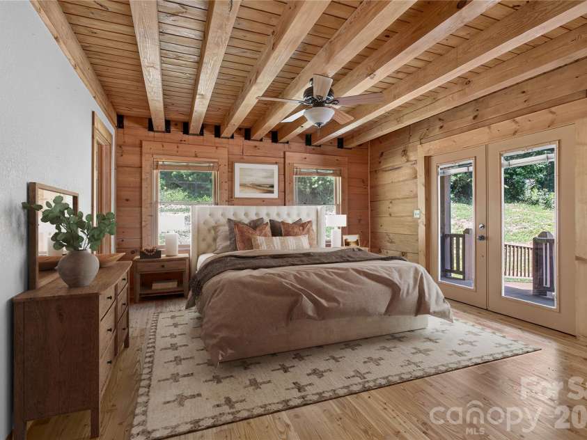 335 Whites Lake Boulevard, Saluda, NC 28773.  MLS# CAR4390961, YatesRealty ID 35568. Virtually staged primary bedroom.